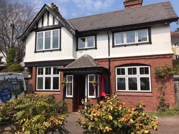 black foiled outer white sash window